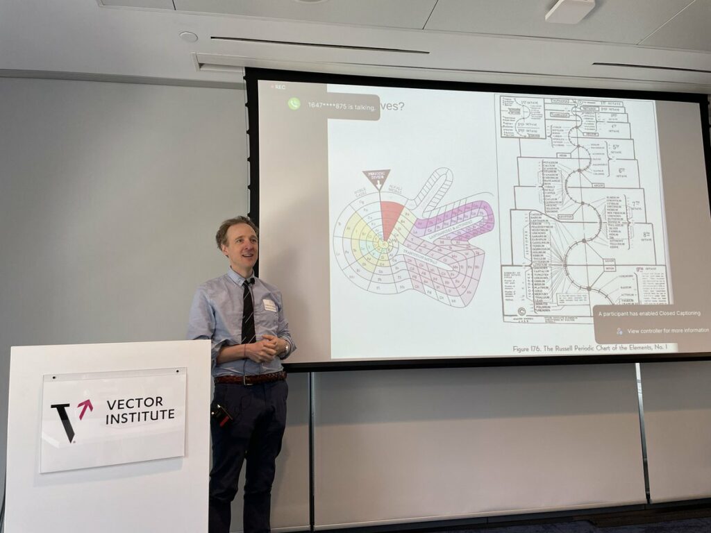 Anatole von Lilienfeld, membre de la faculté Vector, devant sa présentation Powerpoint.