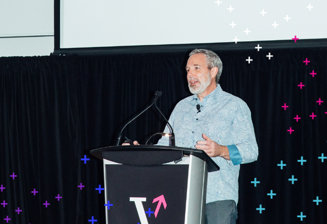 Brendan Frey speaks on stage at Remarkable 2024