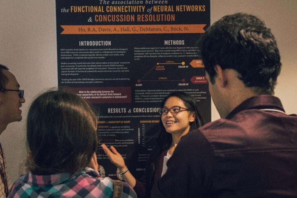 McMaster students presenting their research poster.