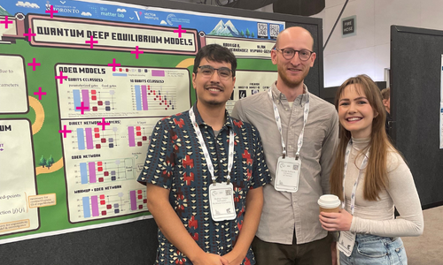 Three people stand in front of a research poster